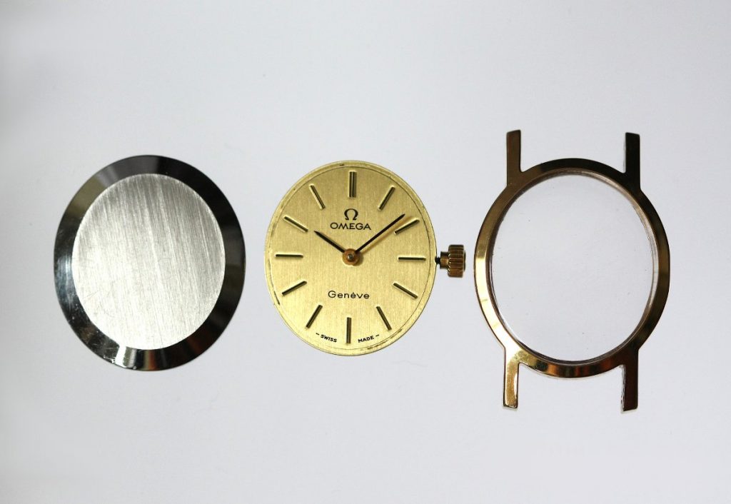 オメガのアンティーク時計の分解、文字盤とケースと裏蓋