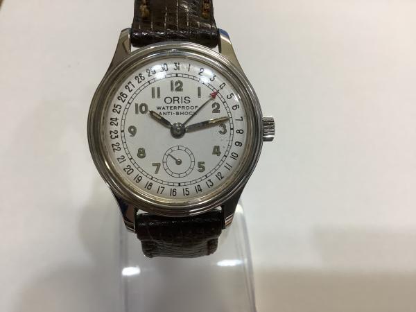 オリスのポインターデイト手巻き6651のオーバーホールを行いました。